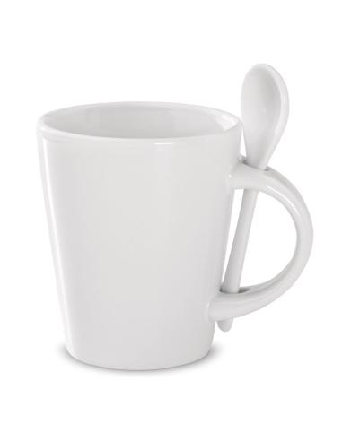 Taza con cuchara de cerámica.